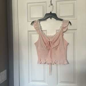 light pink smocked top